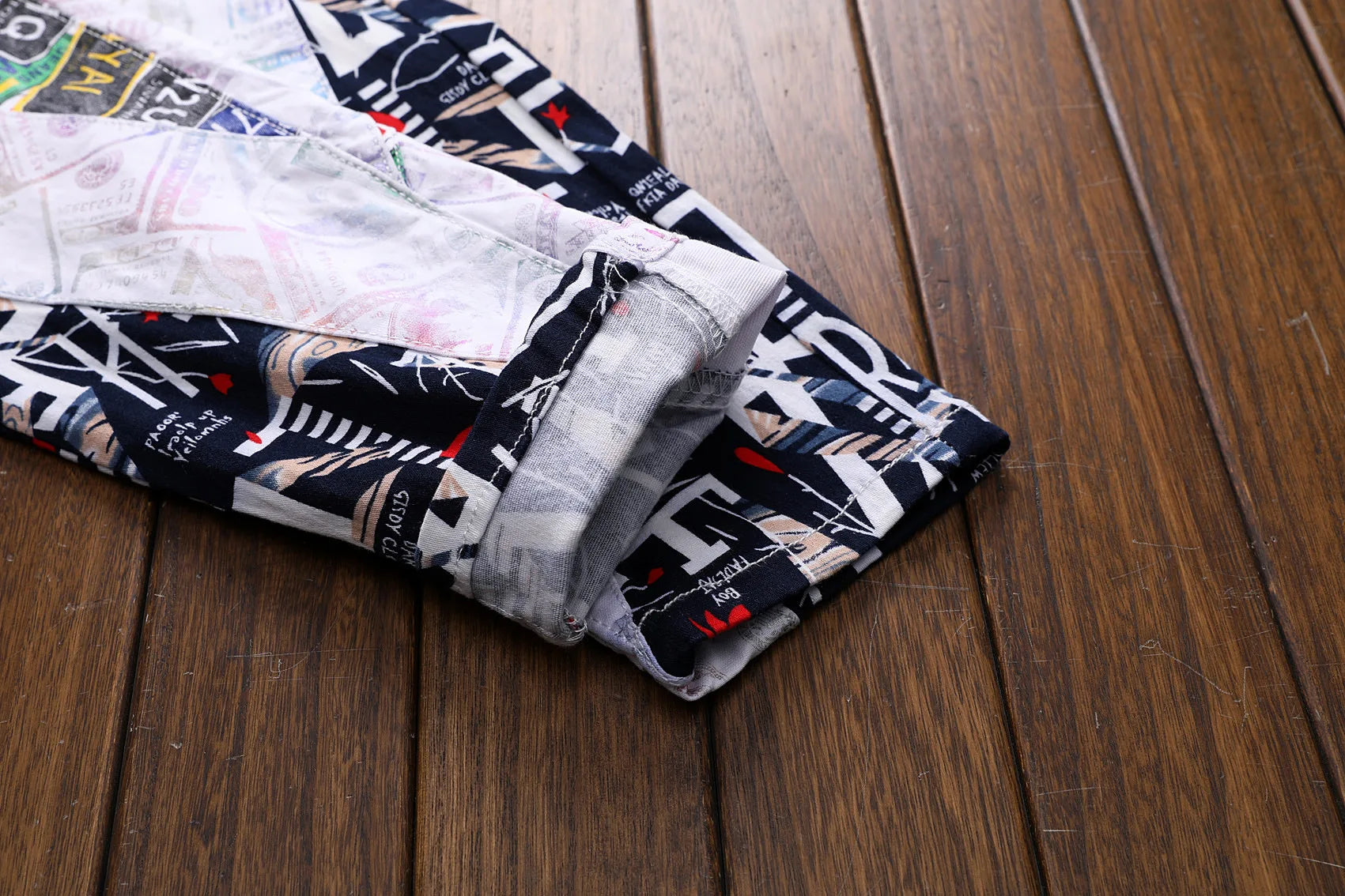 Folded fabric with a pattern on a wooden surface