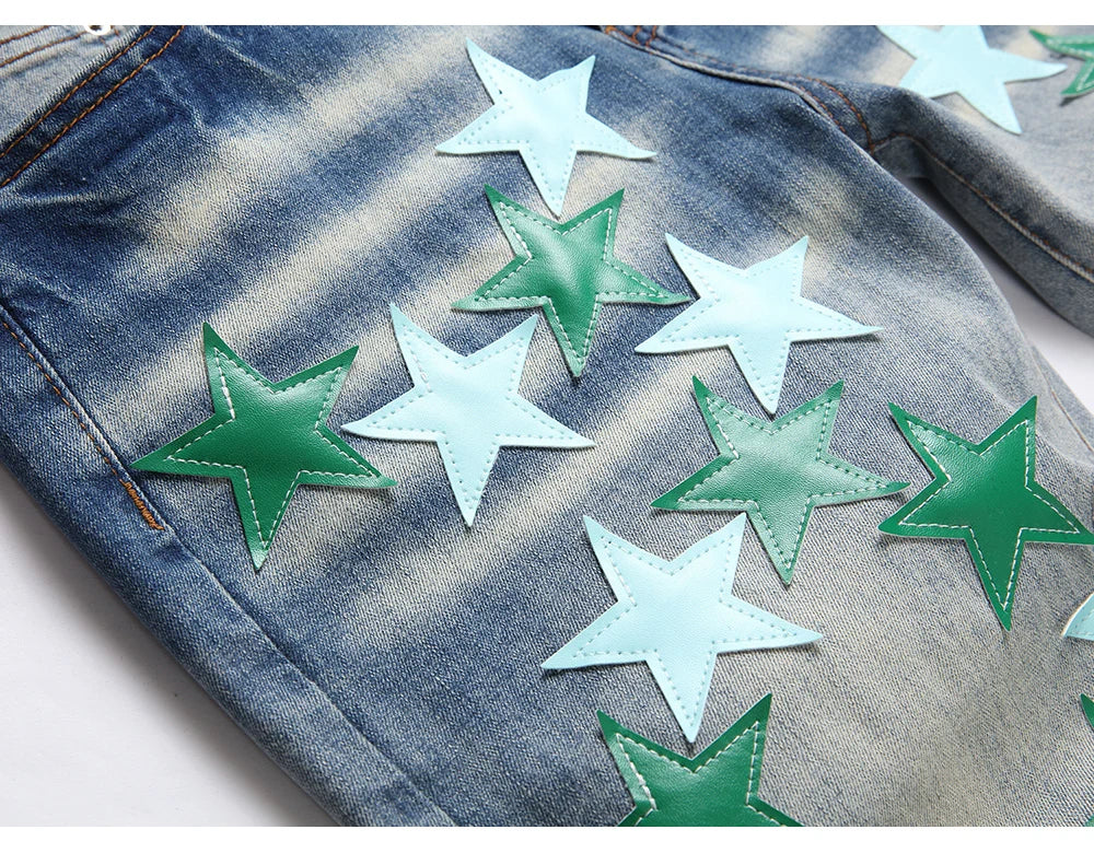 Men Leather Stars Patch Denim Jeans Streetwear Slim Tapered Pants Holes Ripped Distressed Stretch Cotton Trousers