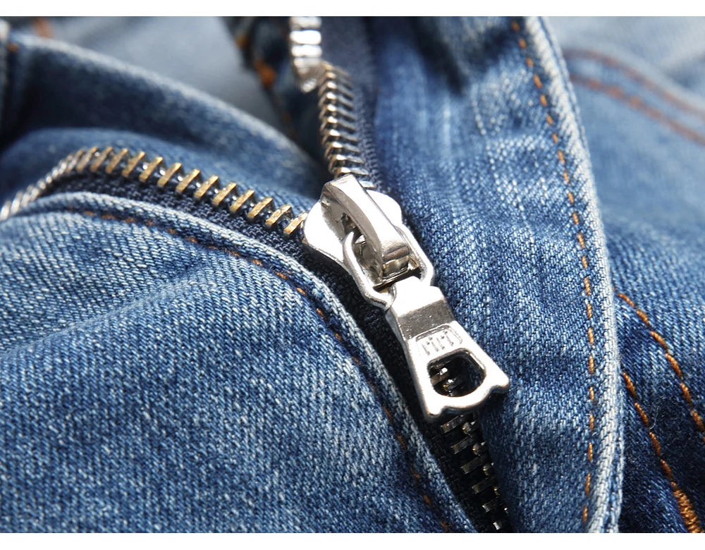 Men Leather Stars Patch Denim Jeans Streetwear Slim Tapered Pants Holes Ripped Distressed Stretch Cotton Trousers